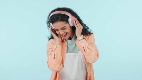 Happy-woman,-dance-or-music-headphones-in-studio