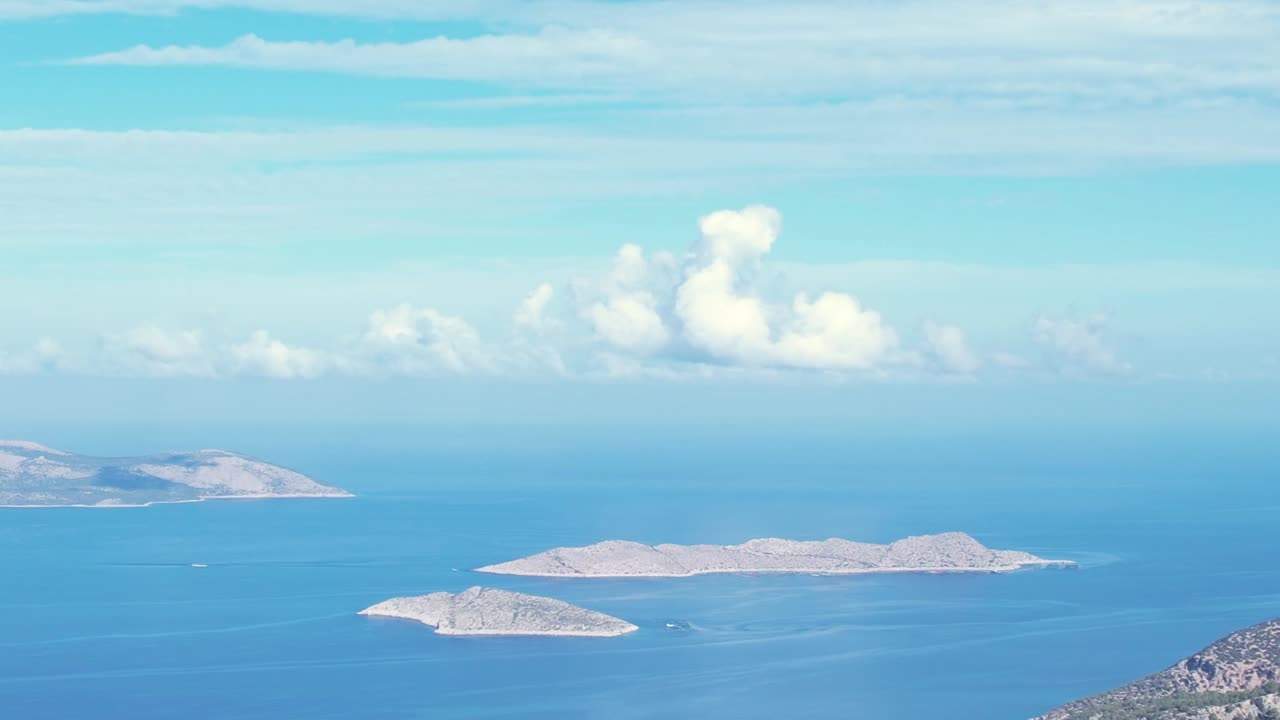 Breathtaking aerial view of Greek islands under a clear blue sky
