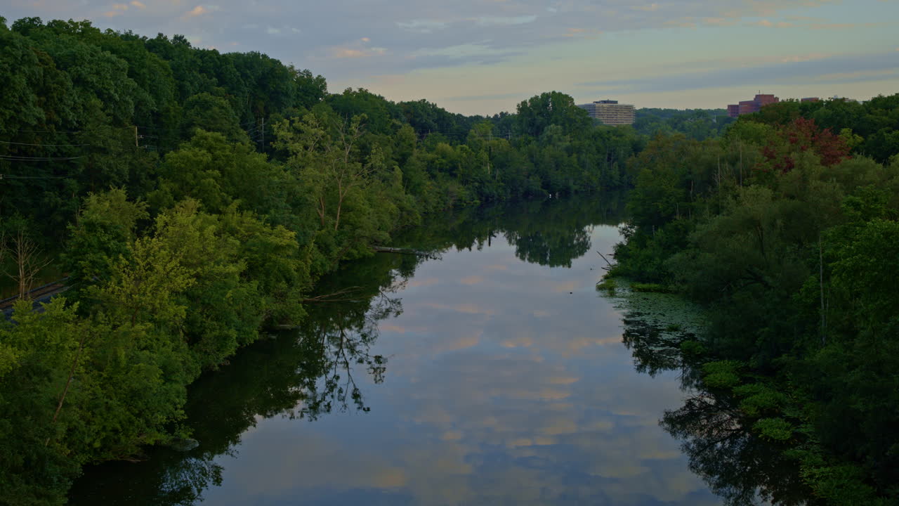 Serene River Reflection at Dusk