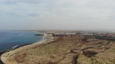 aerial view of empty coastline with view of bikini beach in background at sal cape verde