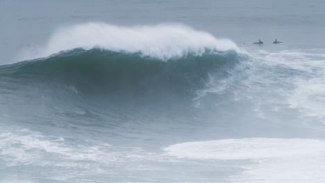 perfect slow motion wave in nazaré, portugal