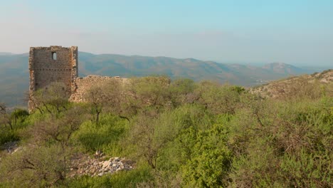 Beautiful-fortification-ruins-of-medieval-Pulpis-castle-in-Maestrat-comarca,-province-of-Castellon,-Valencian-Community,-Spain-at-daytime