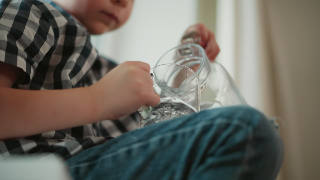 Child pouring water