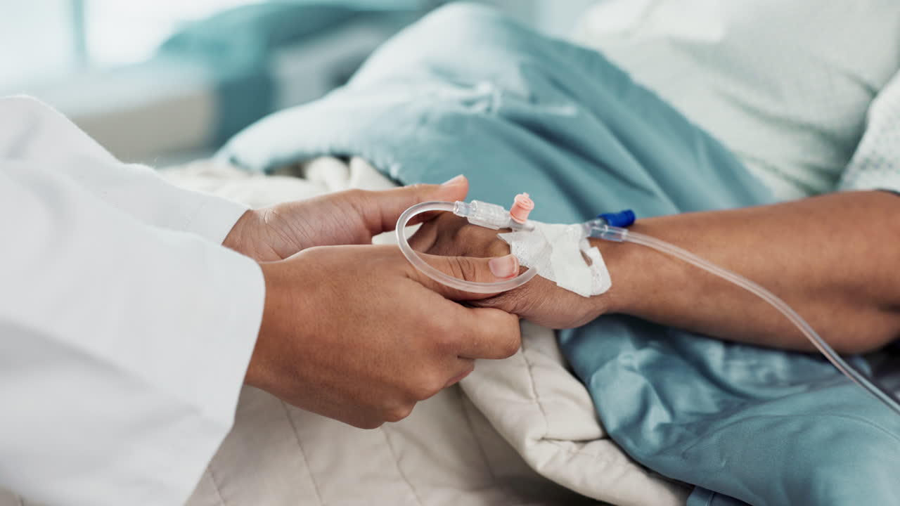 tener las manos, el apoyo y el médico con el paciente