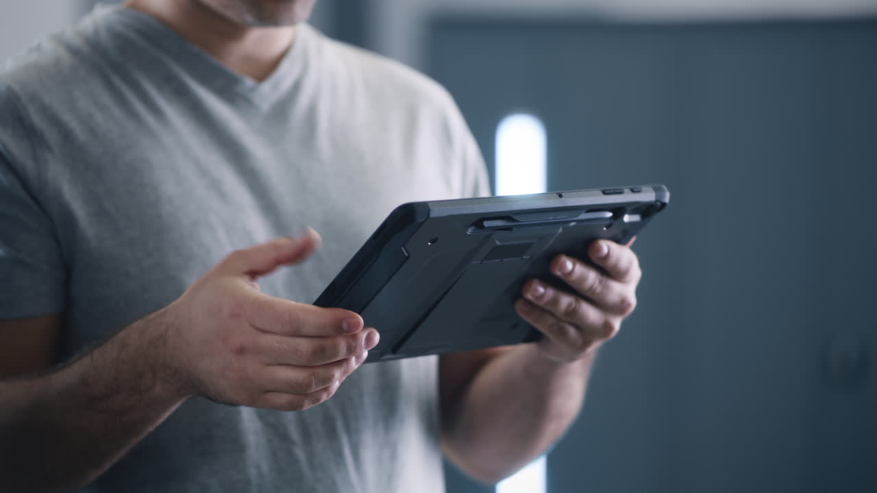 Man holding a tablet device