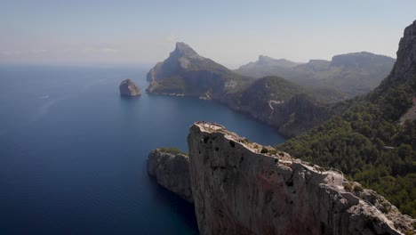 aerial: cape formentor viewing platform with tourists at north coast of mallorca