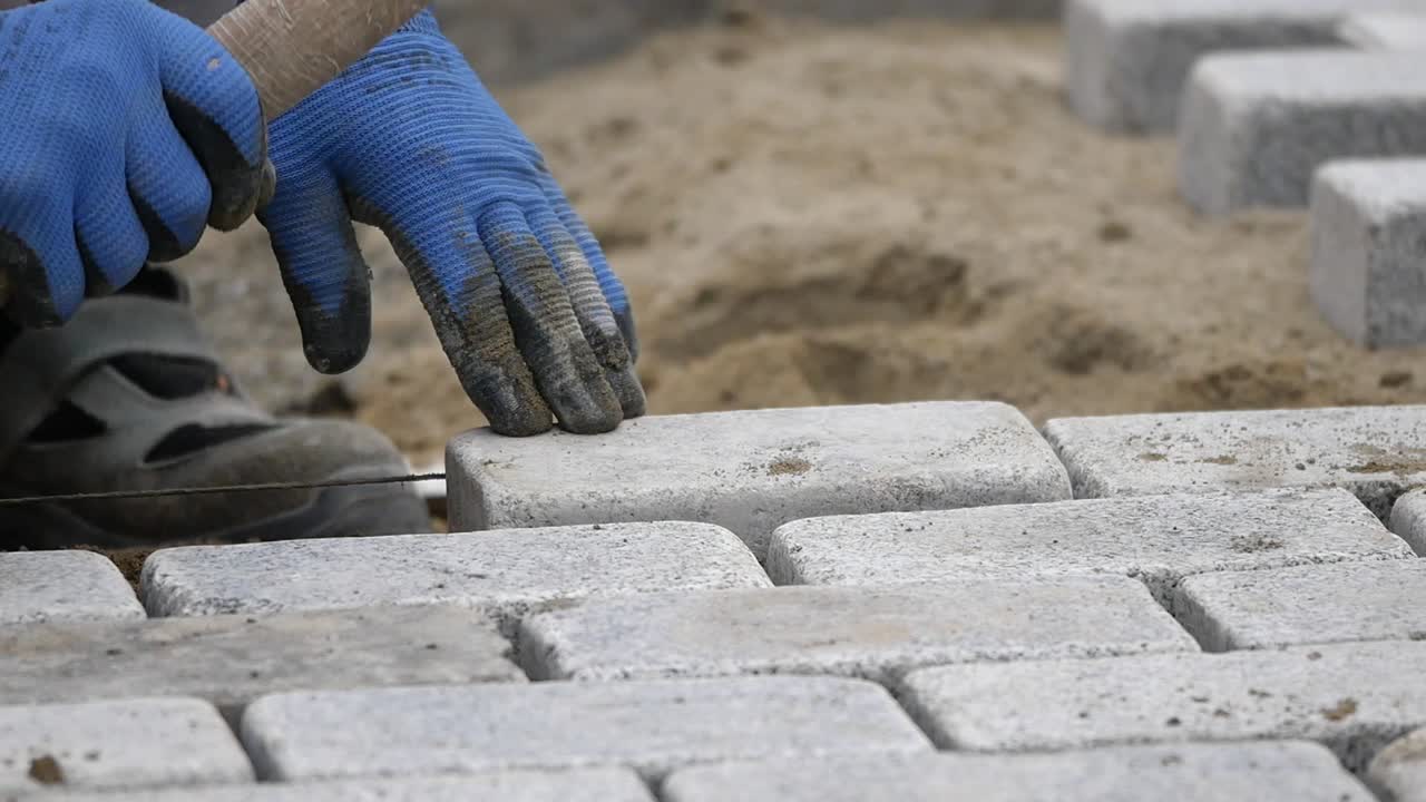 colocación de piedras de pavimentación
