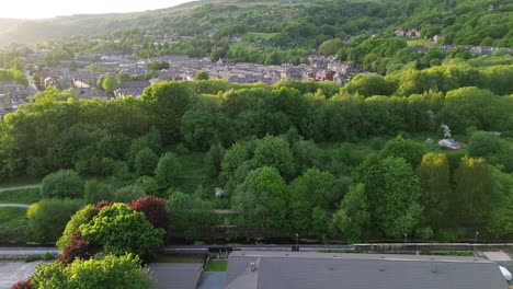 gliding over todmorden town centre on a sunny perfectly calm day in the middle of an english summer