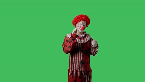 el payaso espeluznante en la pantalla verde