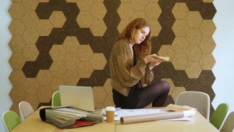 businesswoman selecting the shape of moldings tiles 4k