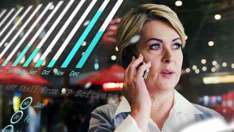 animation of graph, globe and data over happy caucasian woman using phone in city at night
