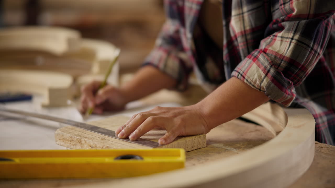 Woodworker crafting a wooden object