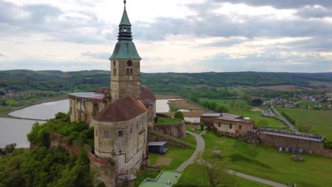 güssing castle overlooking fields and fish pond in burgenland, austria