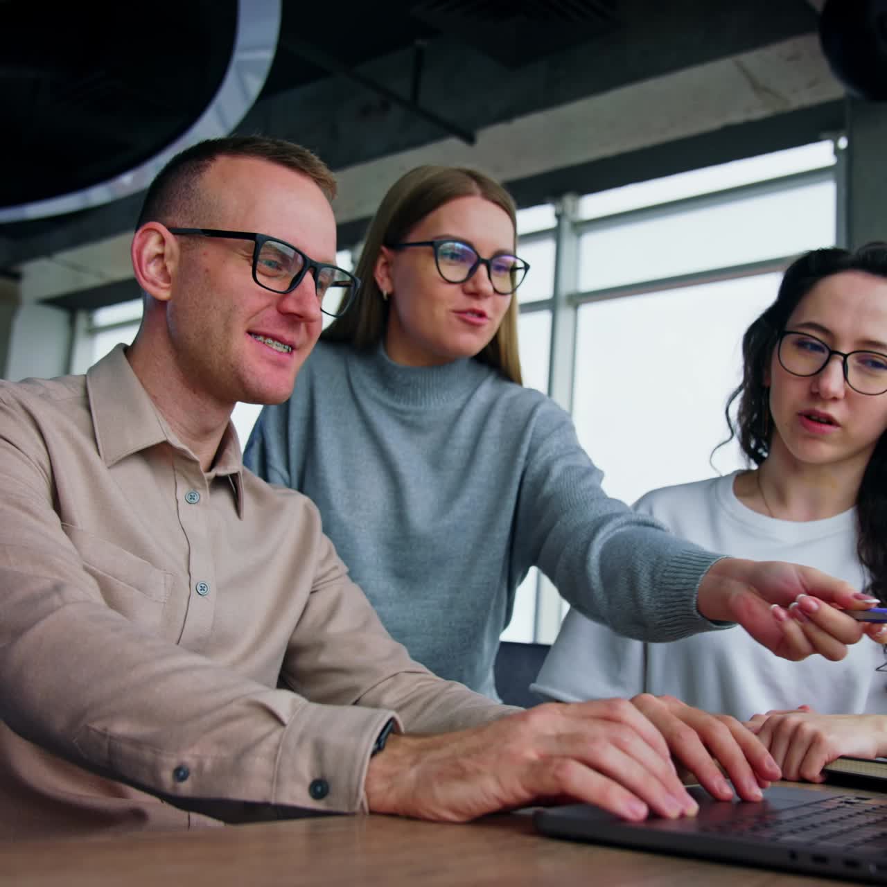 Active discussion among the co-worker in the office. Happy positive productive people brainstorming ideas