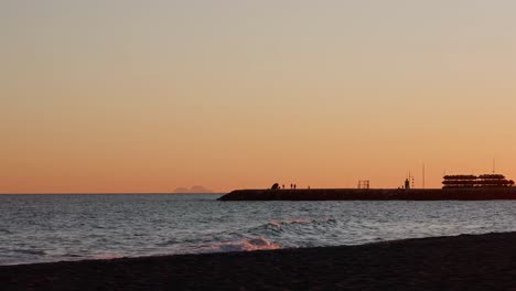 silhouette of cabopino marina after sundown in slow motion