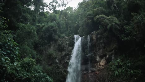 reveal of a large waterfall in the highlands of panama