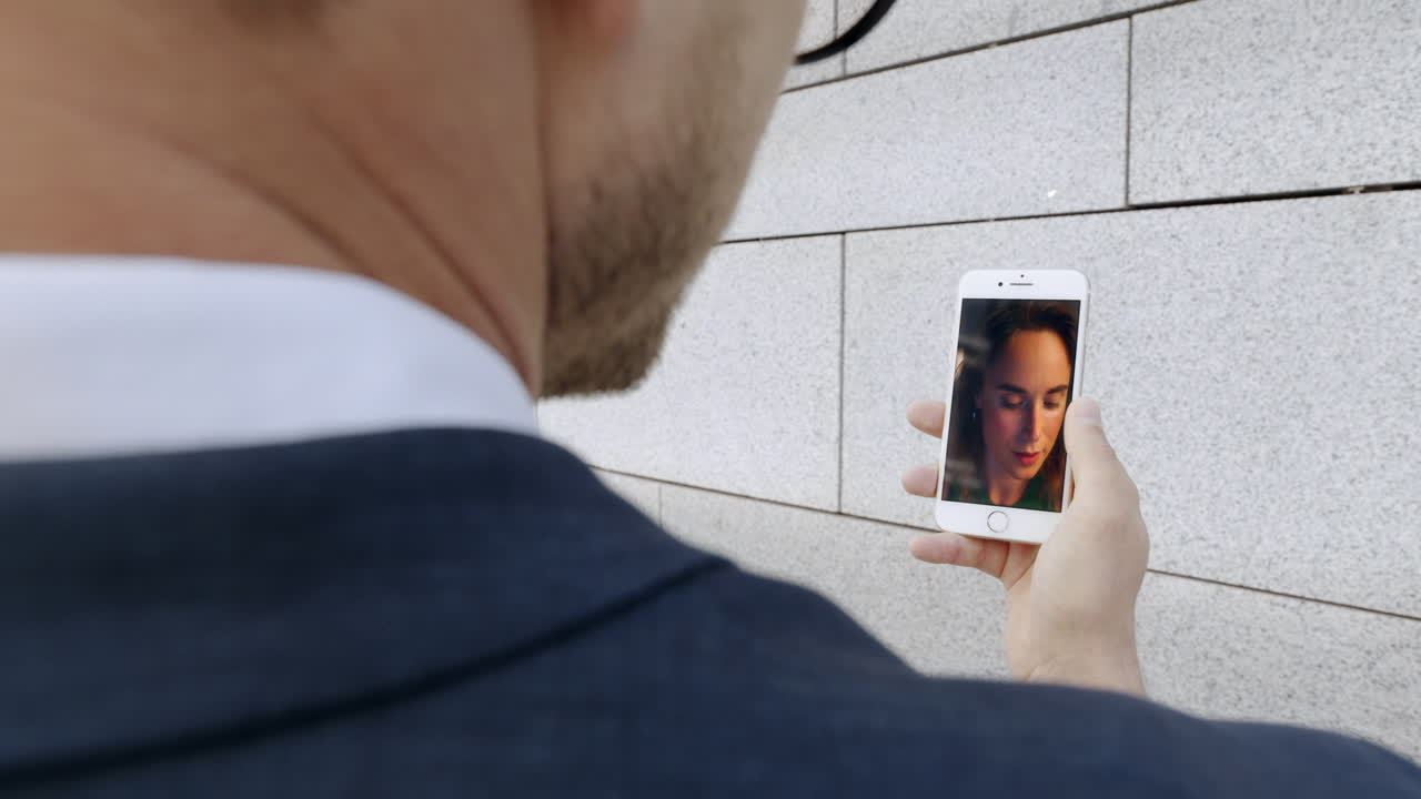 Business people chatting distance meeting by smartphone web camera close up