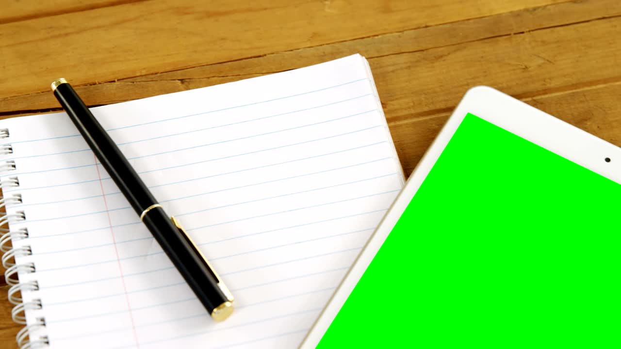 Digital tablet, organizer and pen on table 4k