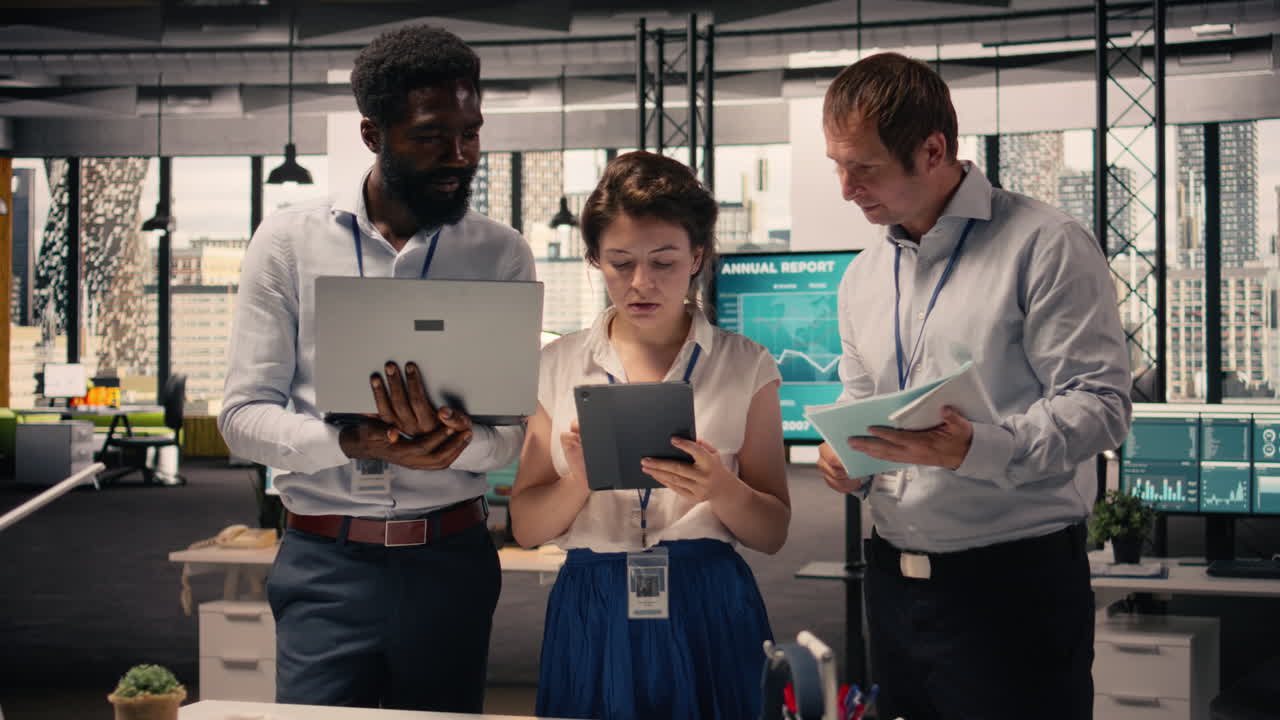 Portrait multiethnic team, working together in office, review business reports