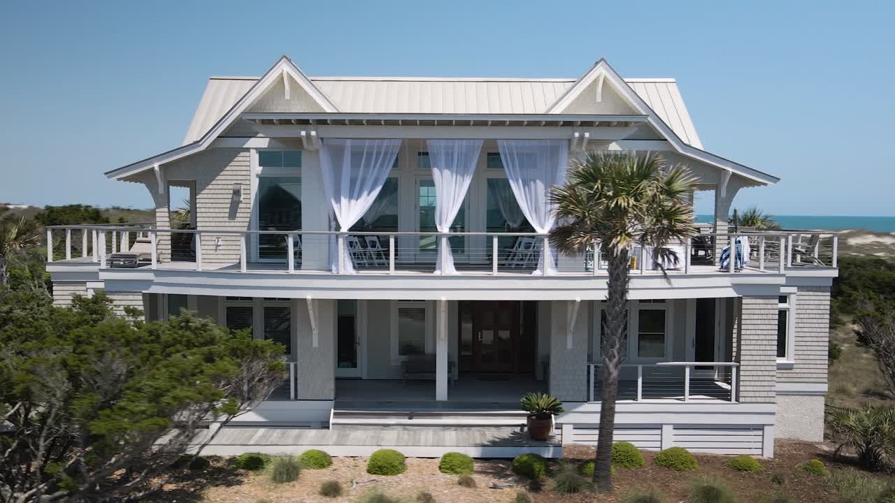 Two-story beachfront apartment Bald Head Island orbiting aerial