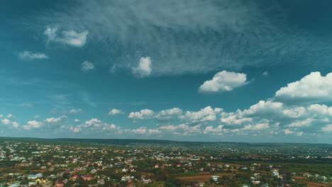 dramatic drone motion over landscape with dark sky before rain.