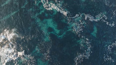 top view of turquoise water of playa de laxe in la coruna, galicia, spain