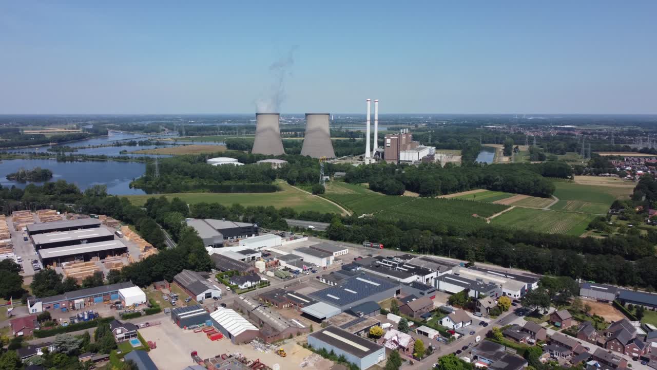 Gas-fired power station Clauscentrale behind city Maasbracht in the Netherlands, Aerial