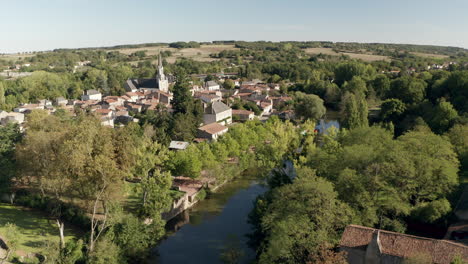 Aerial-drone-point-of-view-of-the-village-of-Saint-Loup-Lamaire-in-Deux-Sevres,-France