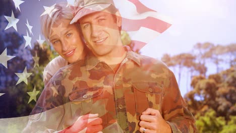 animación de un soldado abrazando a su esposa sonriente sobre la bandera estadounidense