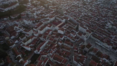 topdown view towards nazare downtown during dusk lights, portugal