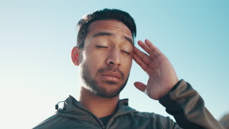 man with headache, blue sky and fitness