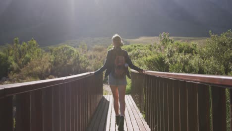 caucasian woman hiking in nature.