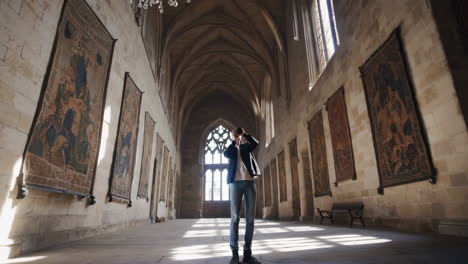 photographer capturing the grandeur of a historic building