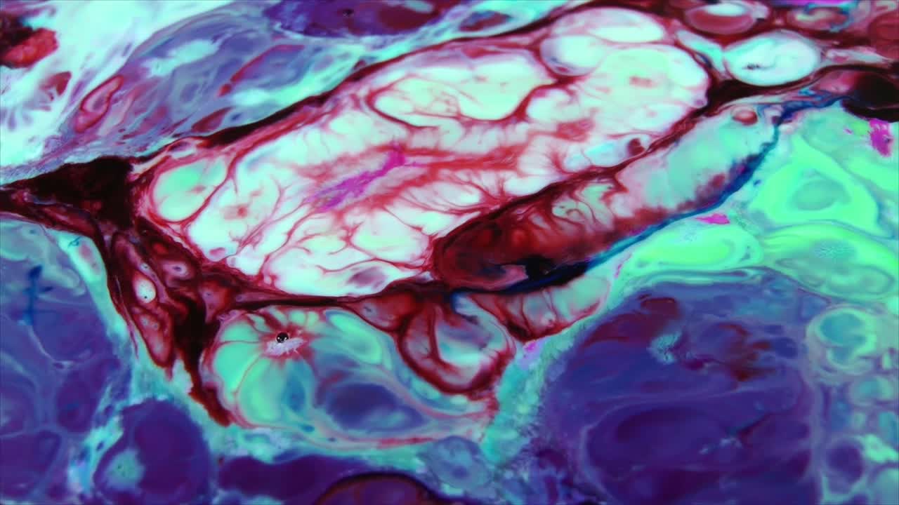 Pintura fluida abstracta vibrante mezclándose y difundiéndose