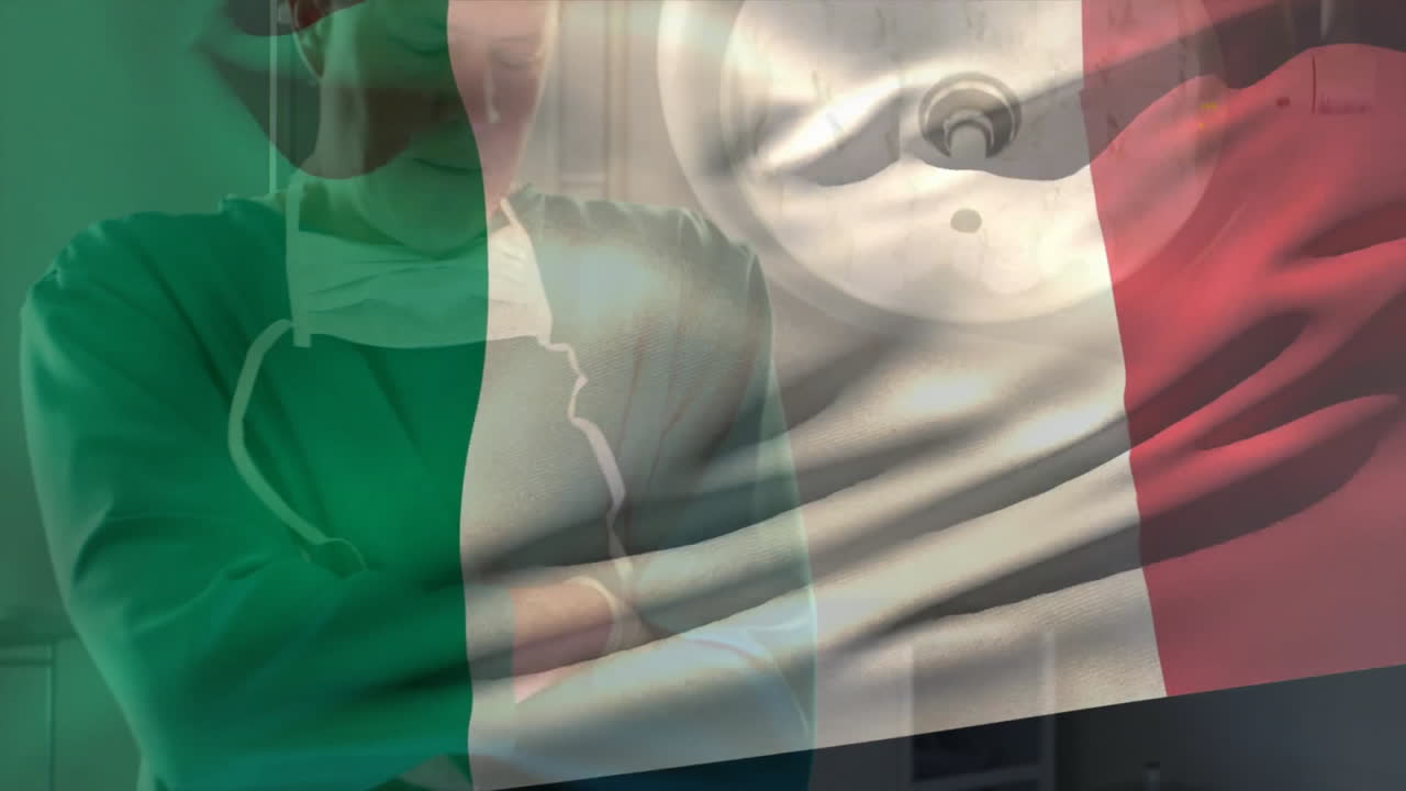 Holding microphone, person in green hoodie with Italian flag animation overlay