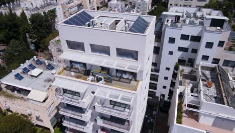 Buildings-with-solar-panel-on-rooftop-around-Bublick-Street-in-the-city-of-Tel-Aviv,-Israel