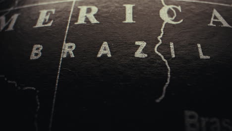 close-up of a vintage globe focusing on brazil and america