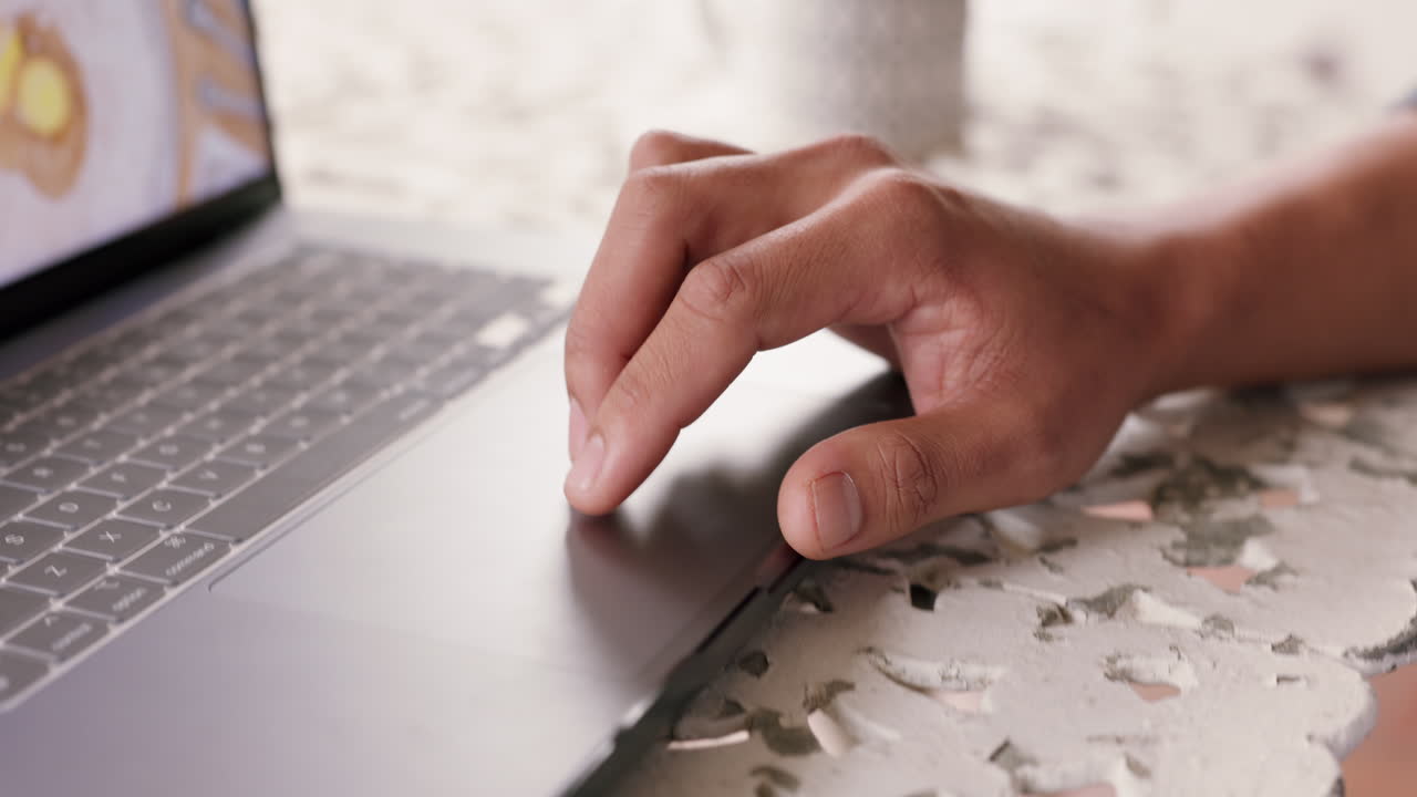 Laptop planning, hands working