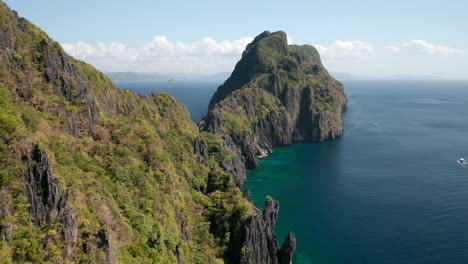 aerial shot of mountian ridge of matinloc island, el nido, palawan, pilippines