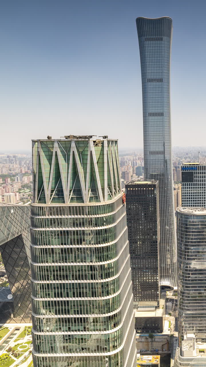Timelapse of the Beijing city skyline from a high vantage point in vertical