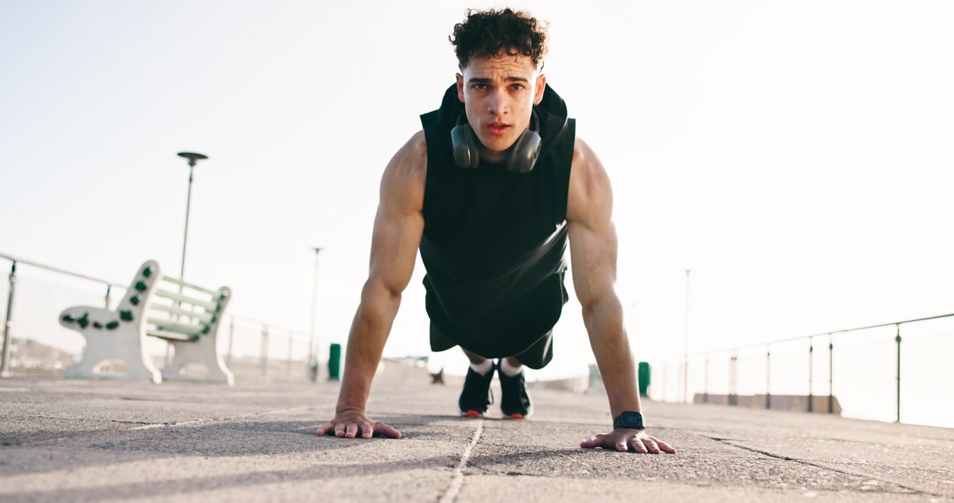 Young Athletic Man Doing Push-Ups Outdoors