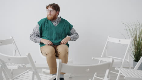 man in a group therapy session