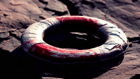 very old abandoned grungy lifebuoy