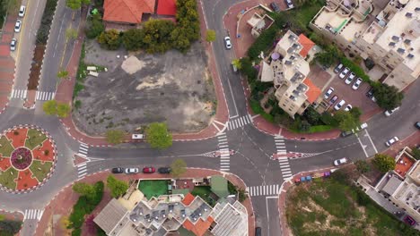 aerial view of a suburban intersection and roundabout