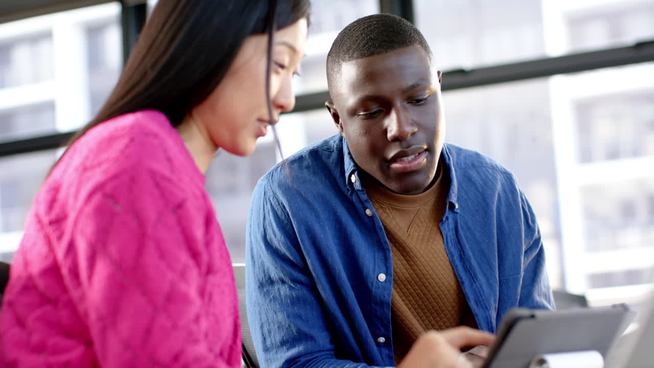 Casual diverse business people talking working together in office, slow motion, copy space