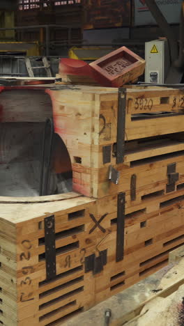 industrial manufacturing process with large molds and machinery