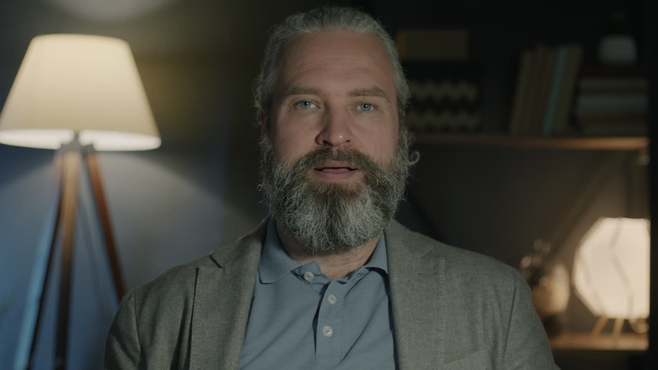 Man speaking in a home setting