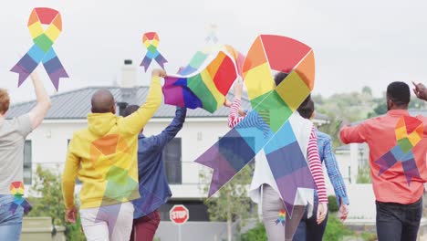 animation of rainbow ribbon over back view of diverse protesters with flags