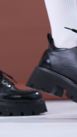 closeup of women's platform ankle boots