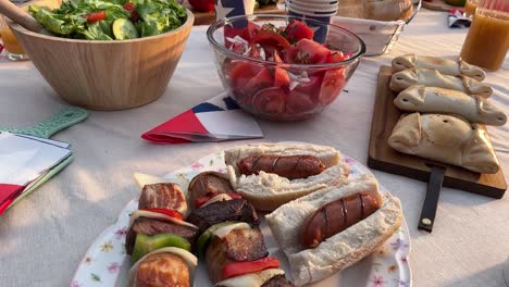 fiestas patrias chile grill parrilla meat chorizo table empanadas pebre